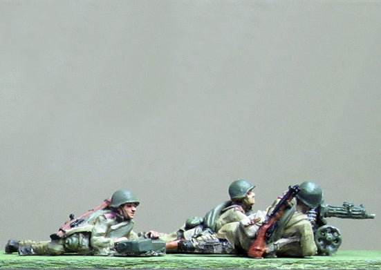 Maxim gun team helmet firing