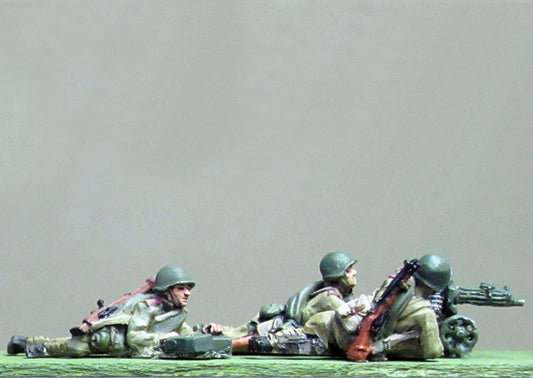 Maxim gun team helmet firing