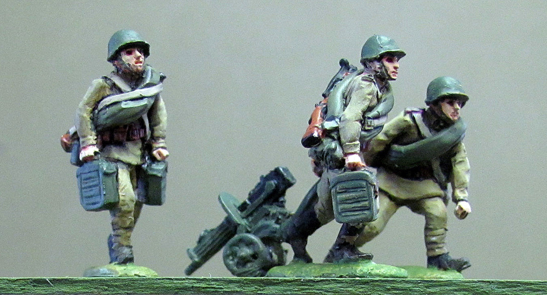 Maxim gun team helmet advancing