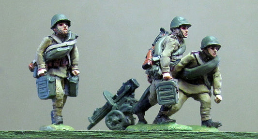 Maxim gun team helmet advancing